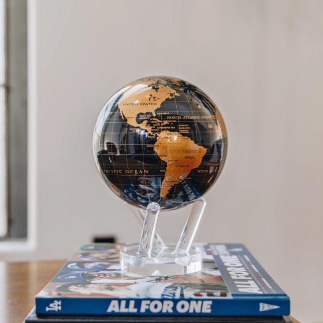 BLACK AND GOLD GLOBE | Hidden magnets provide movement - MOVA EU