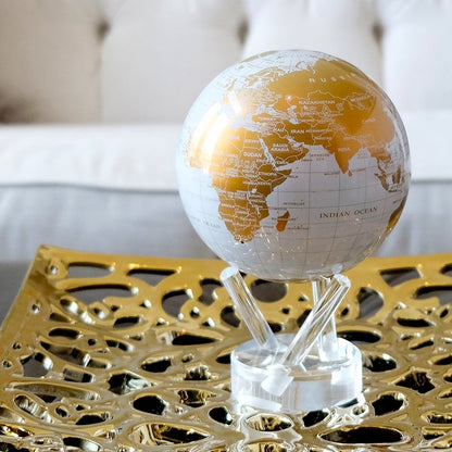 WHITE AND GOLD GLOBE Hidden magnets provide movement - MOVA EU