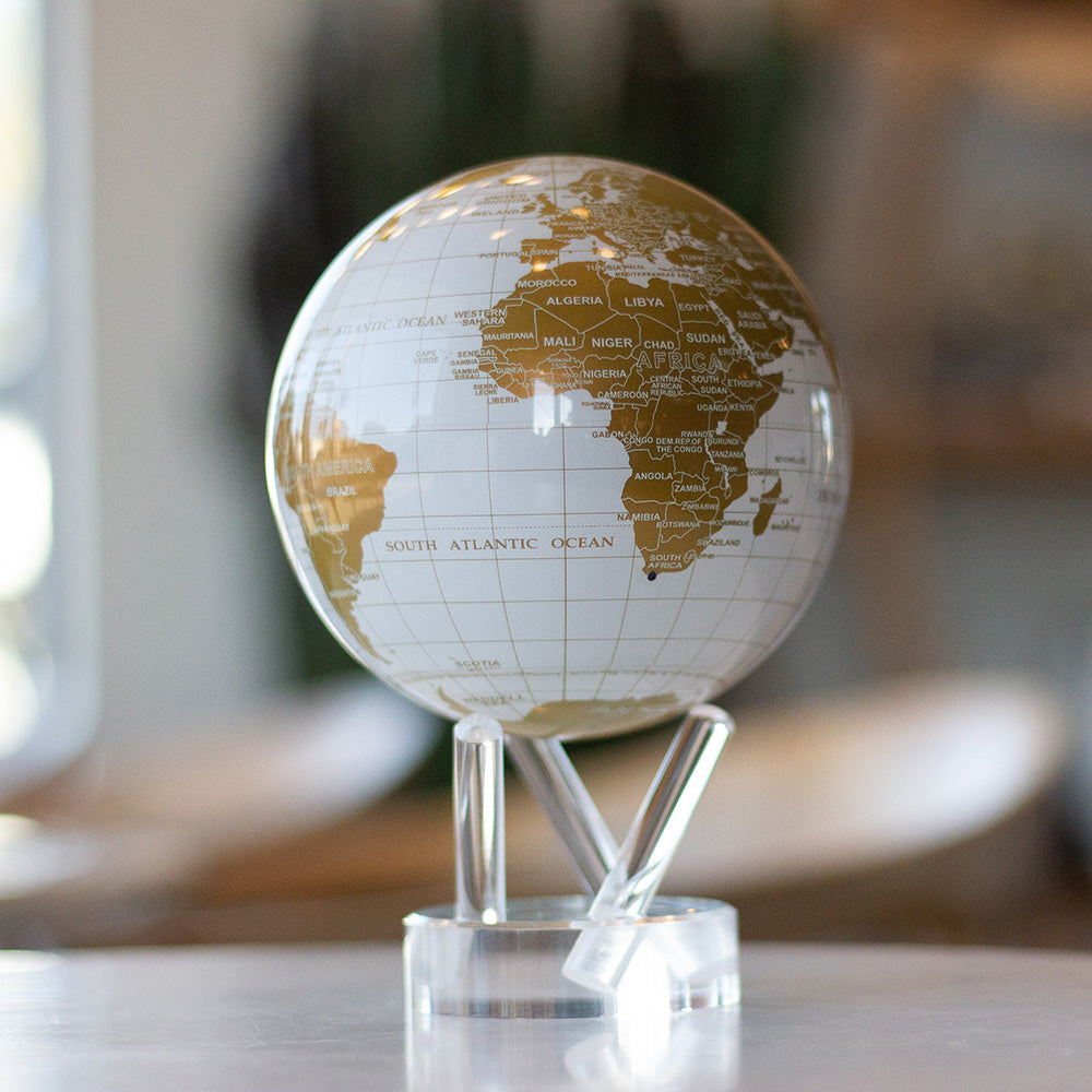 WHITE AND GOLD GLOBE Features latitude and longitude lines - MOVA EU